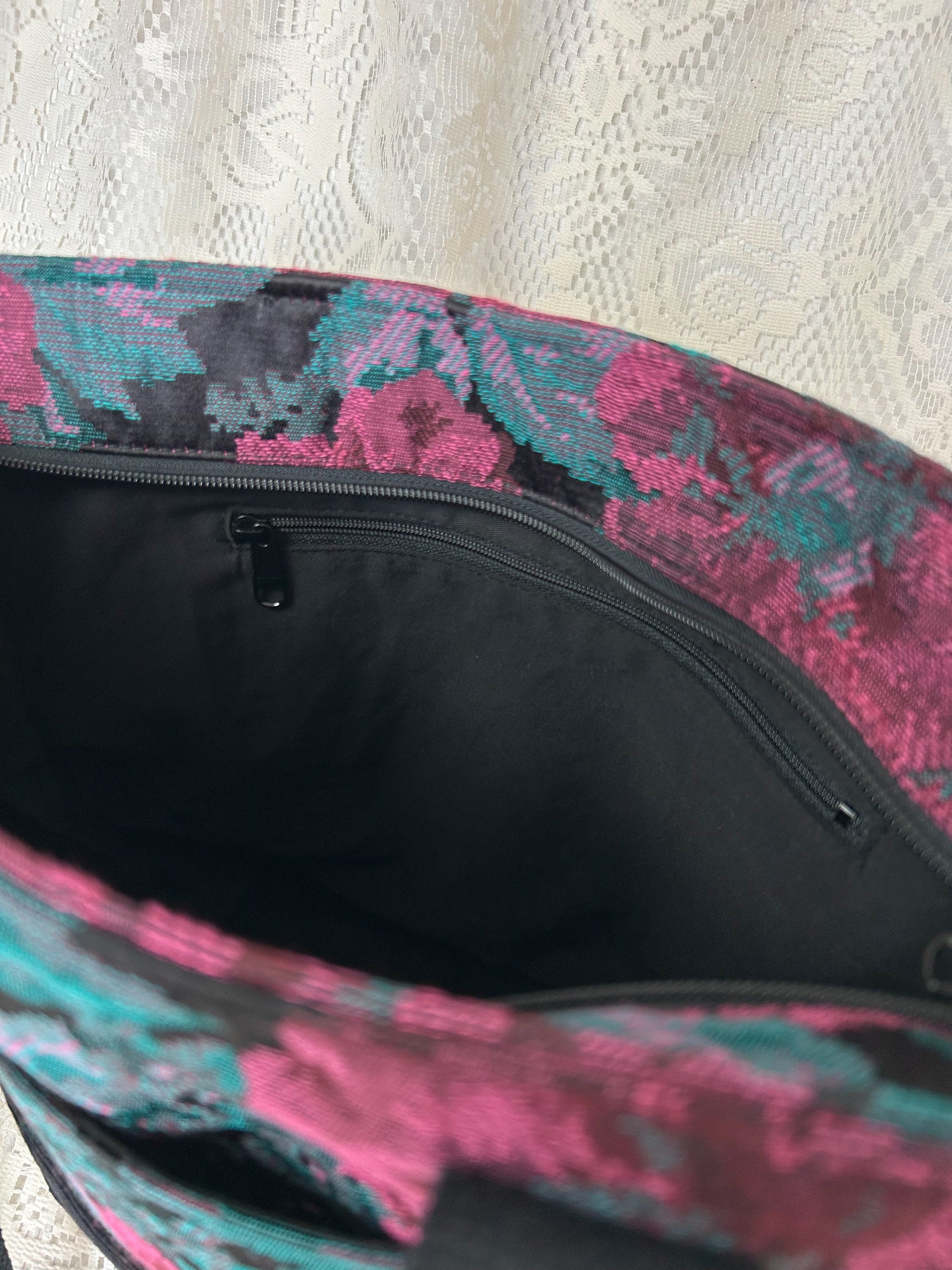 Close up view of the interior zippered pocket